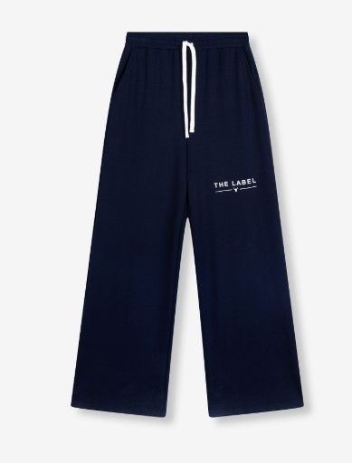 Blauwe ALIX The Label broek model 2508160403 203 met wijde pijpen elastische taille met wit koord en logo op het bovenbeen