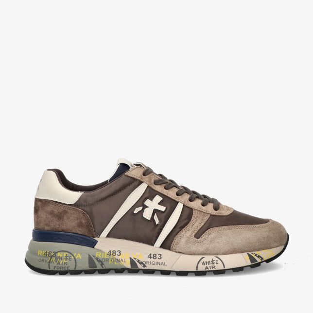 Taupekleurige suède Premiata Lander 7704 sneaker met wit zijlogo crème hiel en dikke zool met blauwe en gele print