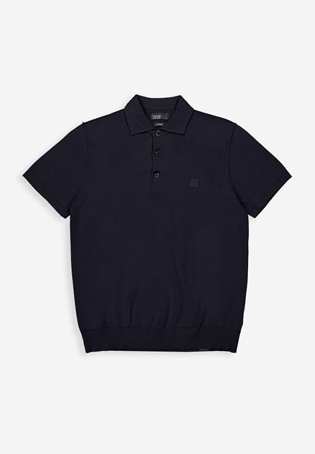 Donkerblauwe gebreide polo van Butcher of Blue Clifden Co met korte mouwen ribzoom en subtiel borstlogo code M2616018 890